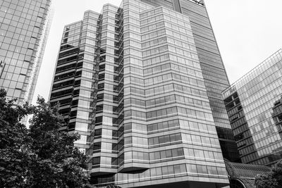Low angle view of modern buildings against sky