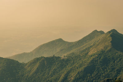 Scenic view of mountains against sky during sunset