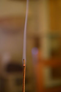 Close up of smoke emitting from incense