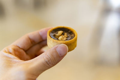 Close-up of person holding ice cream