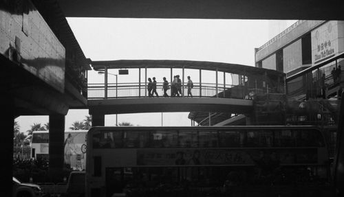 People in city against clear sky