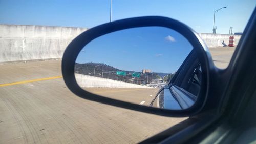 Reflection of car on road