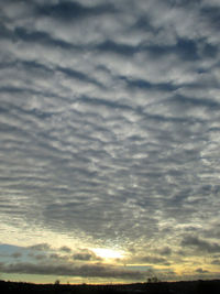 Scenic view of dramatic sky during sunset