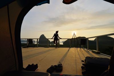 Man against sky during sunset