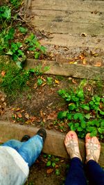 Low section of person standing on ground