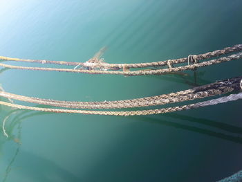 Close-up of sailboat in sea