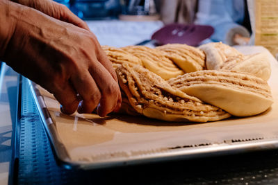 Close-up of person preparing food