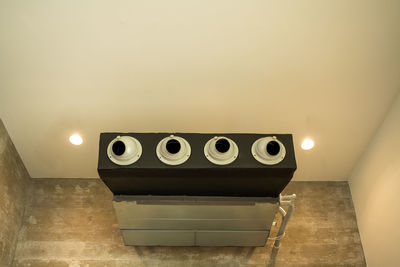 Illuminated electric lamp on wall