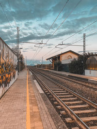 Railroad station platform against sky