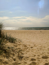 Scenic view of beach against sky