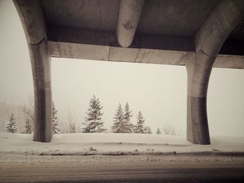 Bridge over street during winter