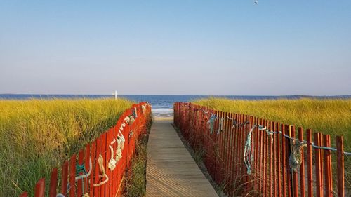 Panoramic view of beach against clear sky