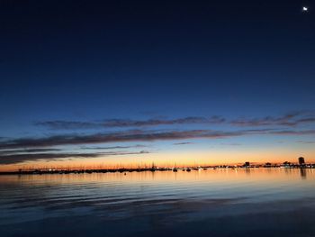 Scenic view of sea against sky at sunset