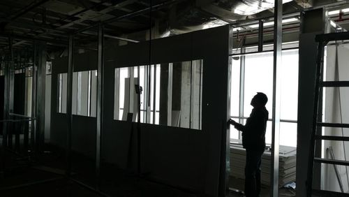 Silhouette of man in airport