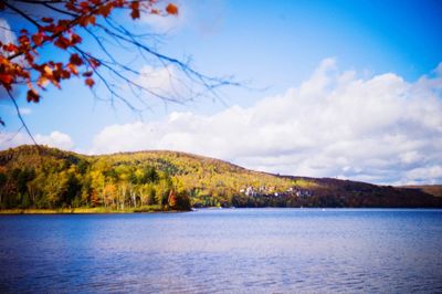 Scenic view of lake against cloudy sky