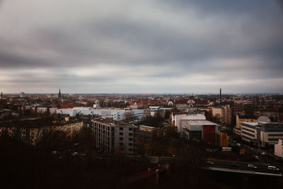 High angle view of buildings against sky at dusk