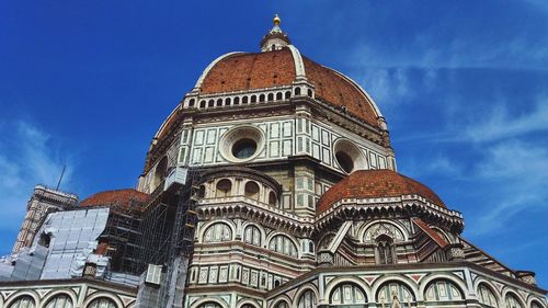 Low angle view of cathedral against blue sky