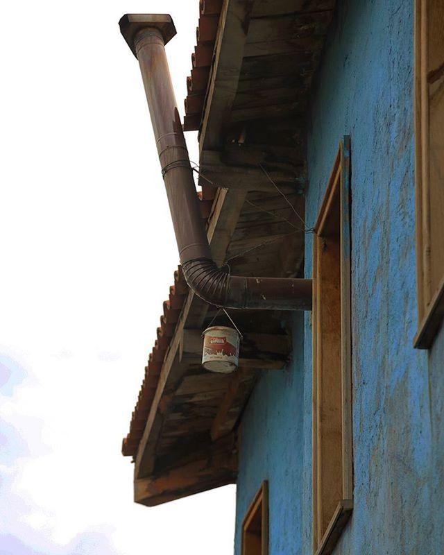 architecture, built structure, low angle view, building exterior, architectural column, house, old, building, wood - material, clear sky, column, day, no people, window, indoors, abandoned, place of worship, religion, history, sunlight