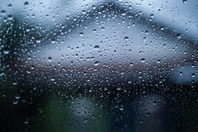 Full frame shot of wet glass window