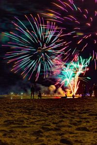 Firework display at night