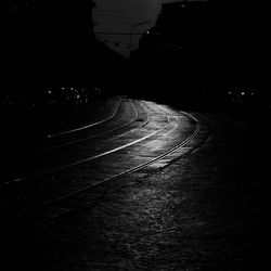 View of railroad tracks at night