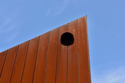 Low angle view of building against blue sky