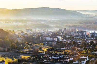 Cityscape with mountain range in background