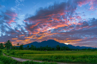 Scenic view of mountains against sky during sunset