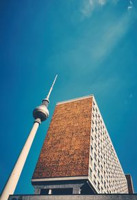 Low angle view of building against blue sky