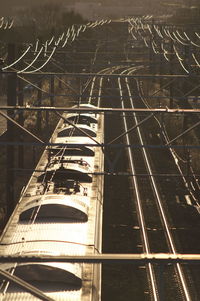 High angle view of railroad tracks by buildings in city