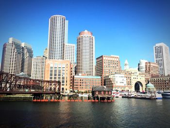 City lit up at waterfront