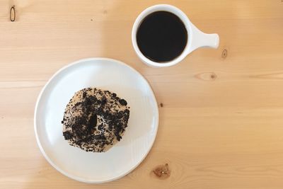 High angle view of coffee served on table