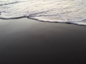 Close-up of sand at beach