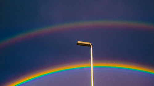 Rainbow against sky at night