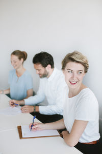 People working in meeting room