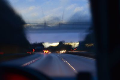 Cars on road seen through car window