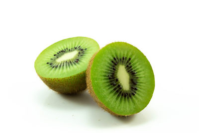 Close-up of fruit against white background