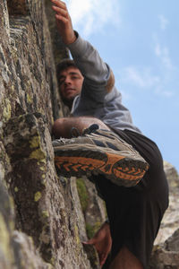 Man climbing wall