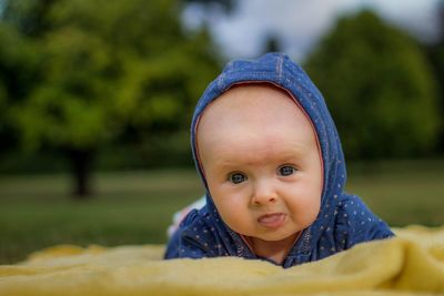 Portrait of cute baby girl outdoors