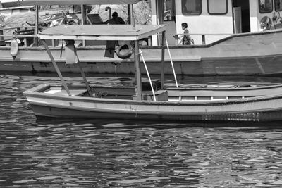 Boats moored in sea