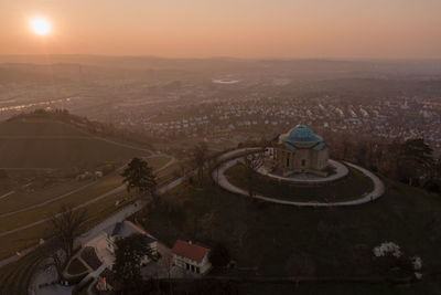 High angle view of city street against sky during sunset