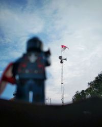 Low angle view of flag against sky