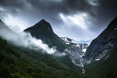 Scenic view of majestic mountains against sky