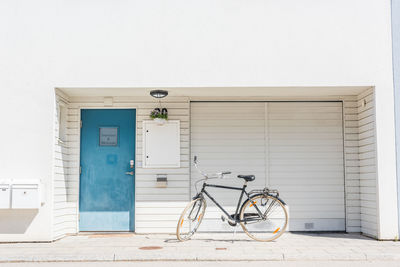 Bicycle parked outside house