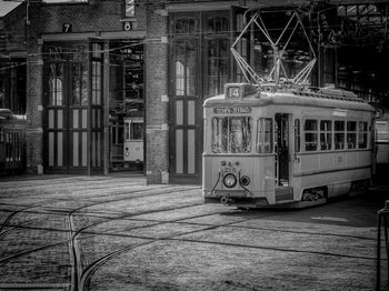 Train on railroad track in city