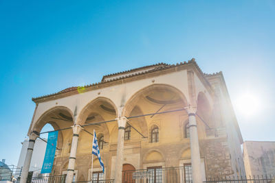 Low angle view of historical building against blue sky