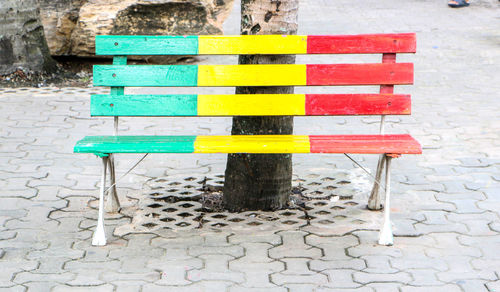 Close-up of multi colored chairs against wall