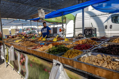 Man standing at market stall