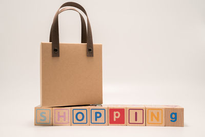 Close-up of padlocks on white background