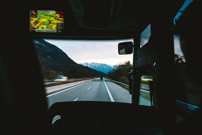 Road seen through car windshield